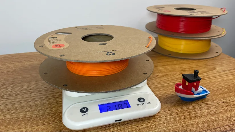 Digital scale weighing 3D printing filament for material cost calculation