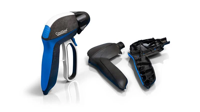 Ergonomic medical hand tool with soft-touch overmolded grip