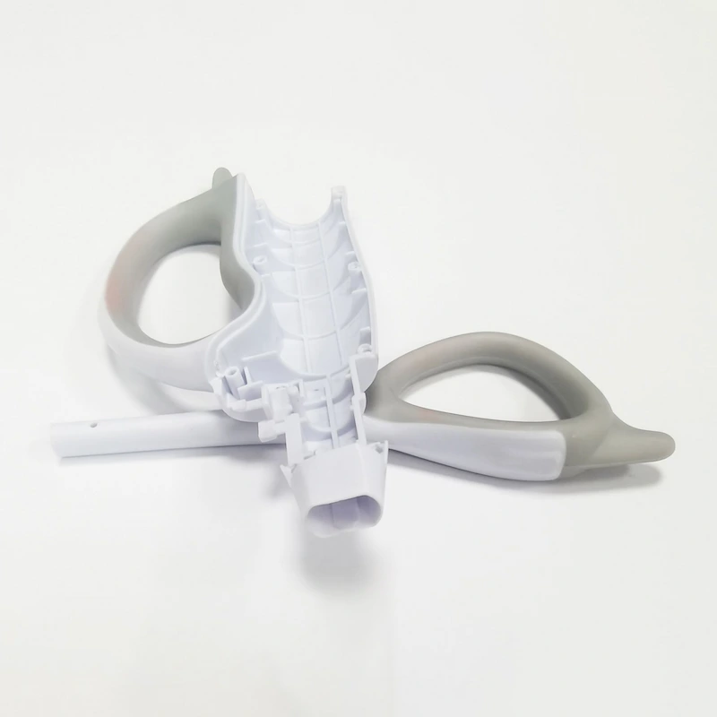 Overmolded soft-touch plastic handle held in hand